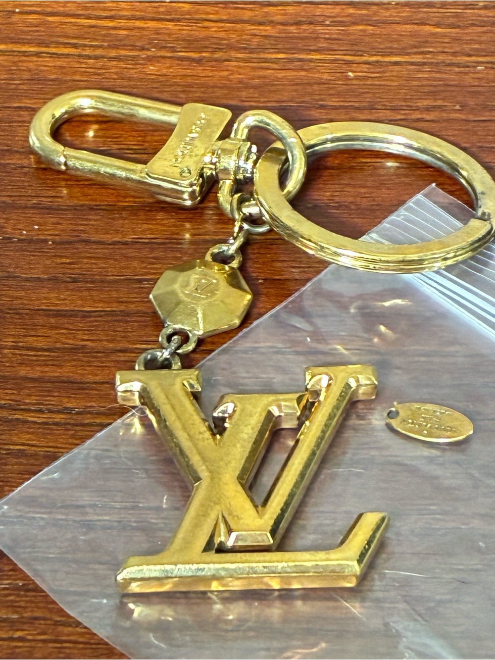 Louis Vuitton Gold LV Logo Keychain